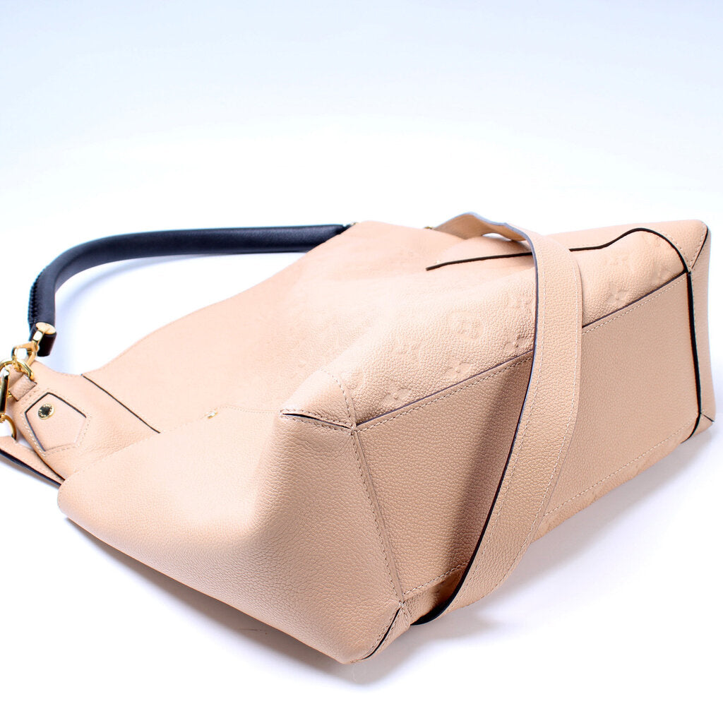 All about the neutrals! Shop this beautiful Louis Vuitton Empreinte Bagatelle  Hobo bag on www.mymoshposh.com!