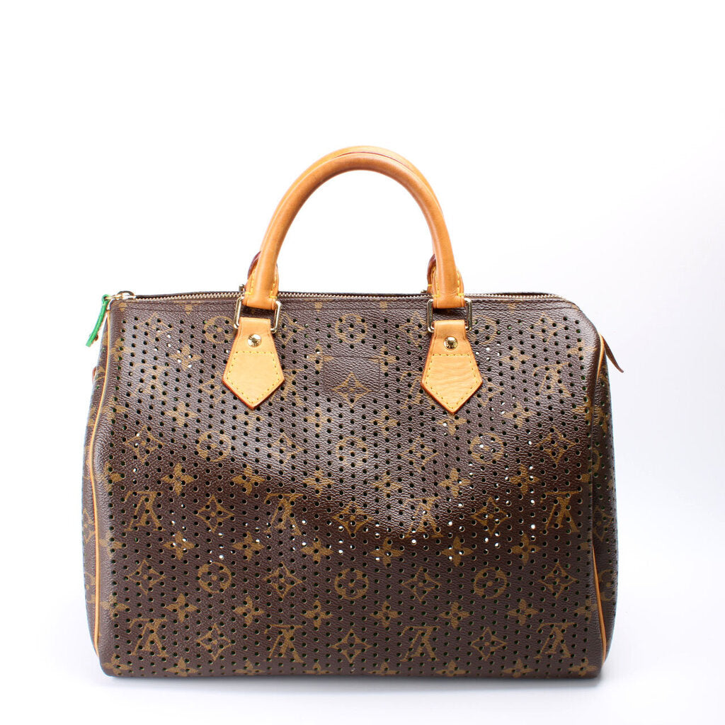 Louis Vuitton pre-owned monogram perforated Speedy 30 handbag - ShopStyle  Satchels & Top Handle Bags