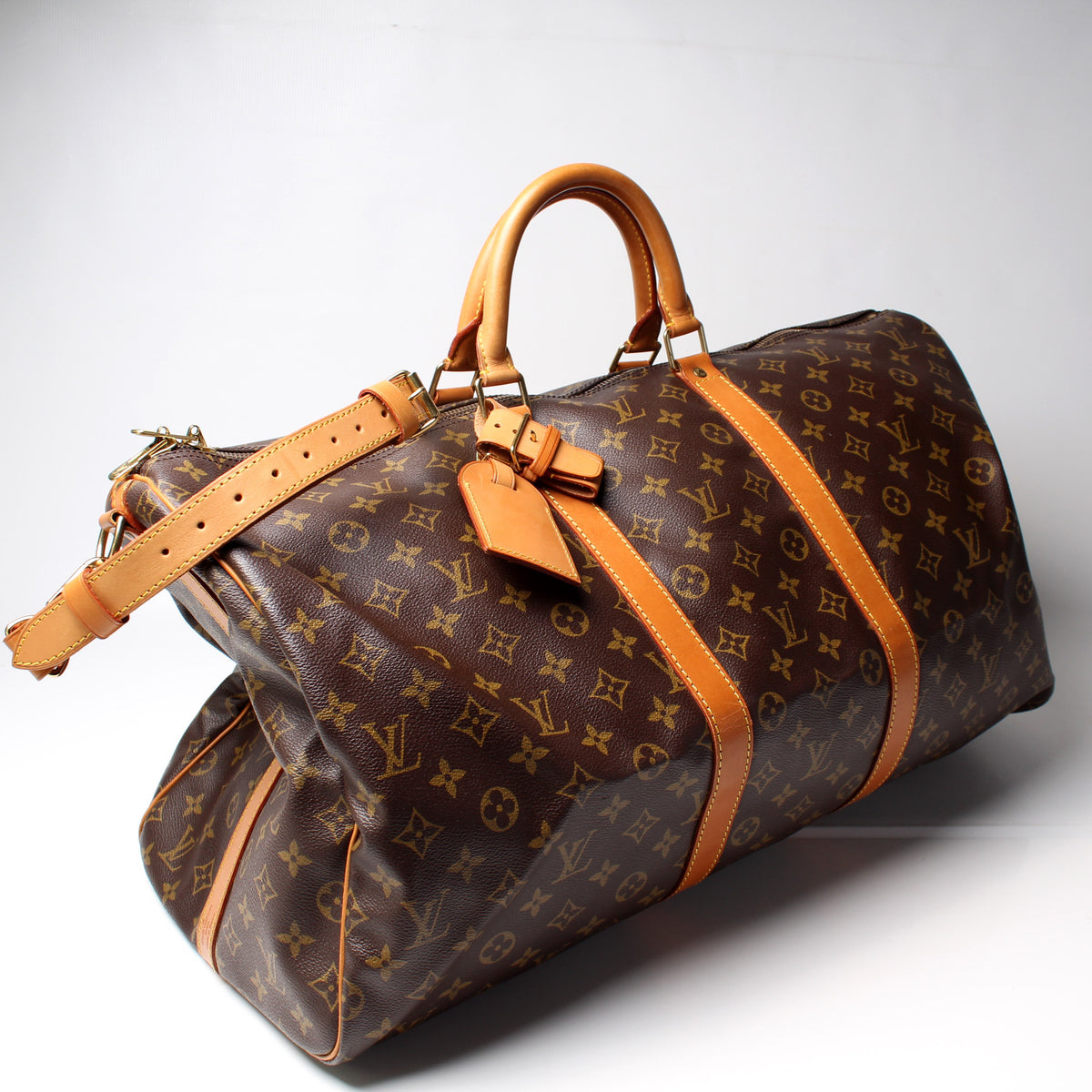 Real Vs Fake what are the 10 differences between these 2 Louis Vuitton  Keepall 45 monogram bag 