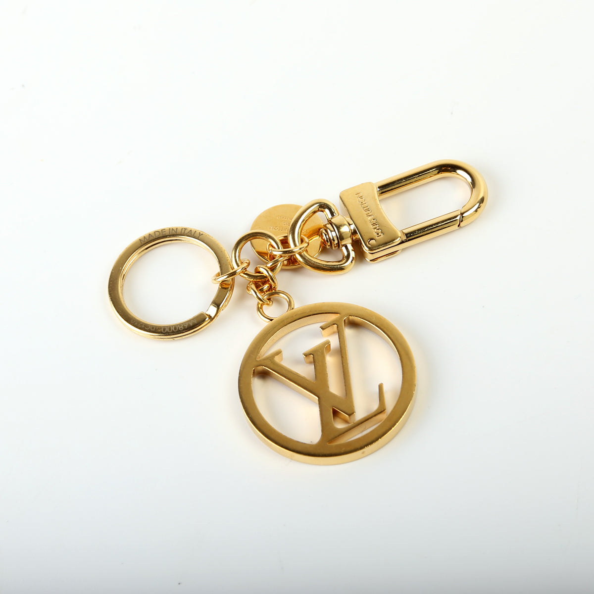 Louis Vuitton LV Cut Circle Bag Charm and Key Holder Metal and Leather  Silver 149902338