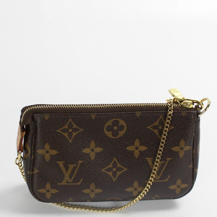 Pochette Accessories Mini Monogram – Keeks Designer Handbags