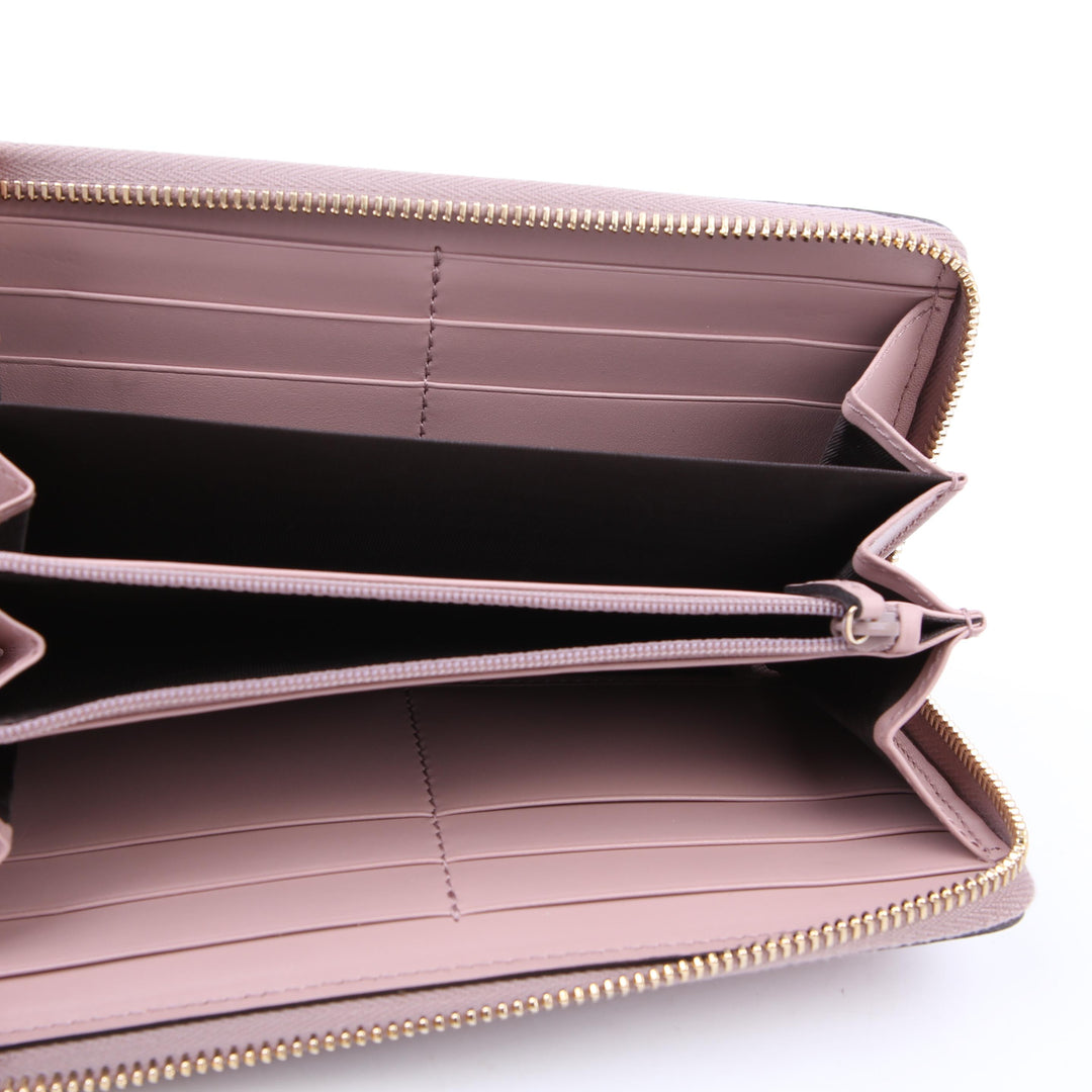 388680 Bow Zip Around Wallet Guccissima Pink