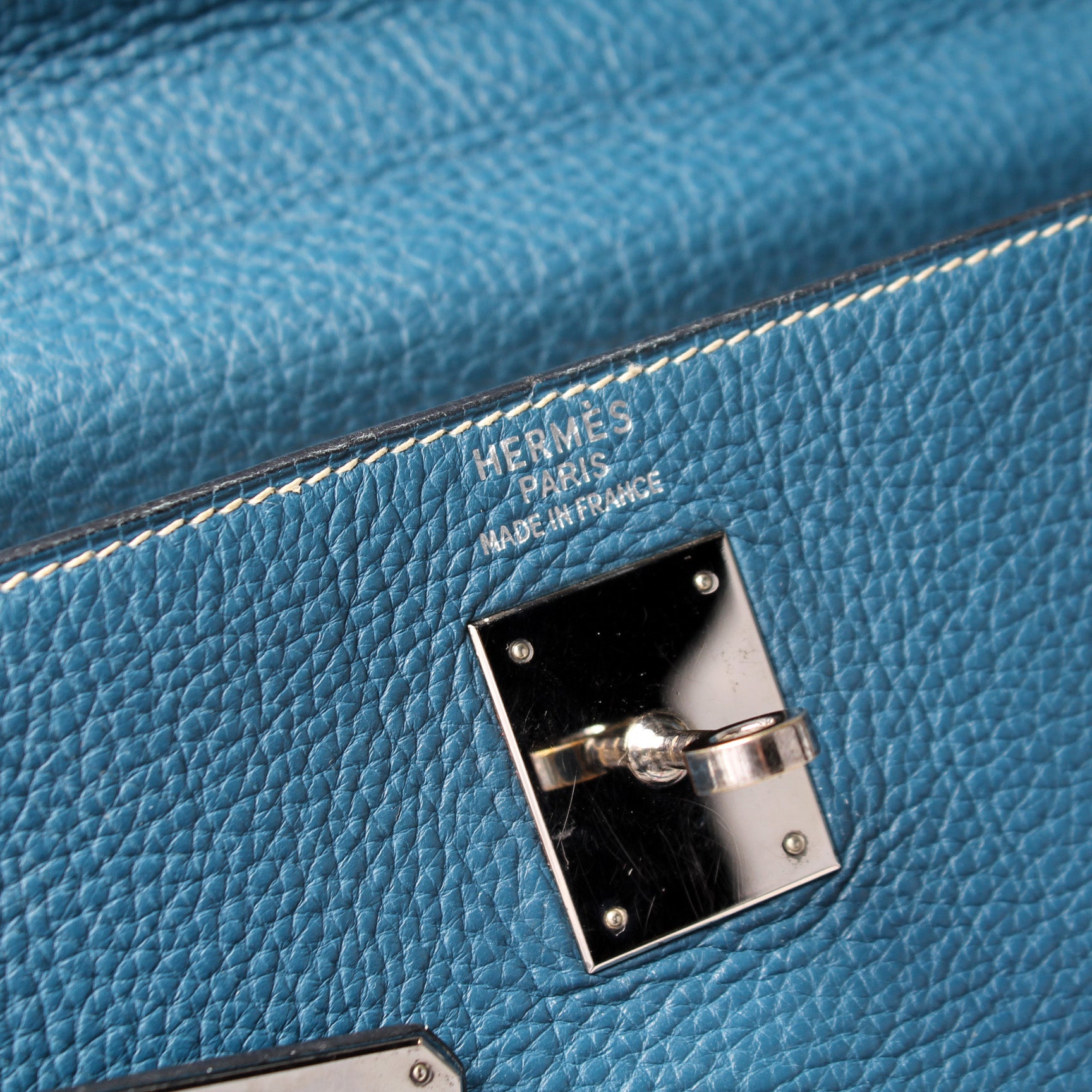 Saclab-Official on X: An Hermès Kelly 35 Retourne handcrafted from Togo  calfskin in Blue Jean, a sophisticated day-to-day shade of blue. Shop this  Kelly bag and more on   / X