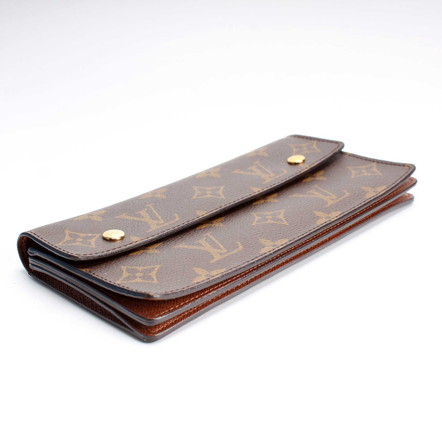 The Louis Vuitton Accodion Moto wallet is classic and edgy at the same