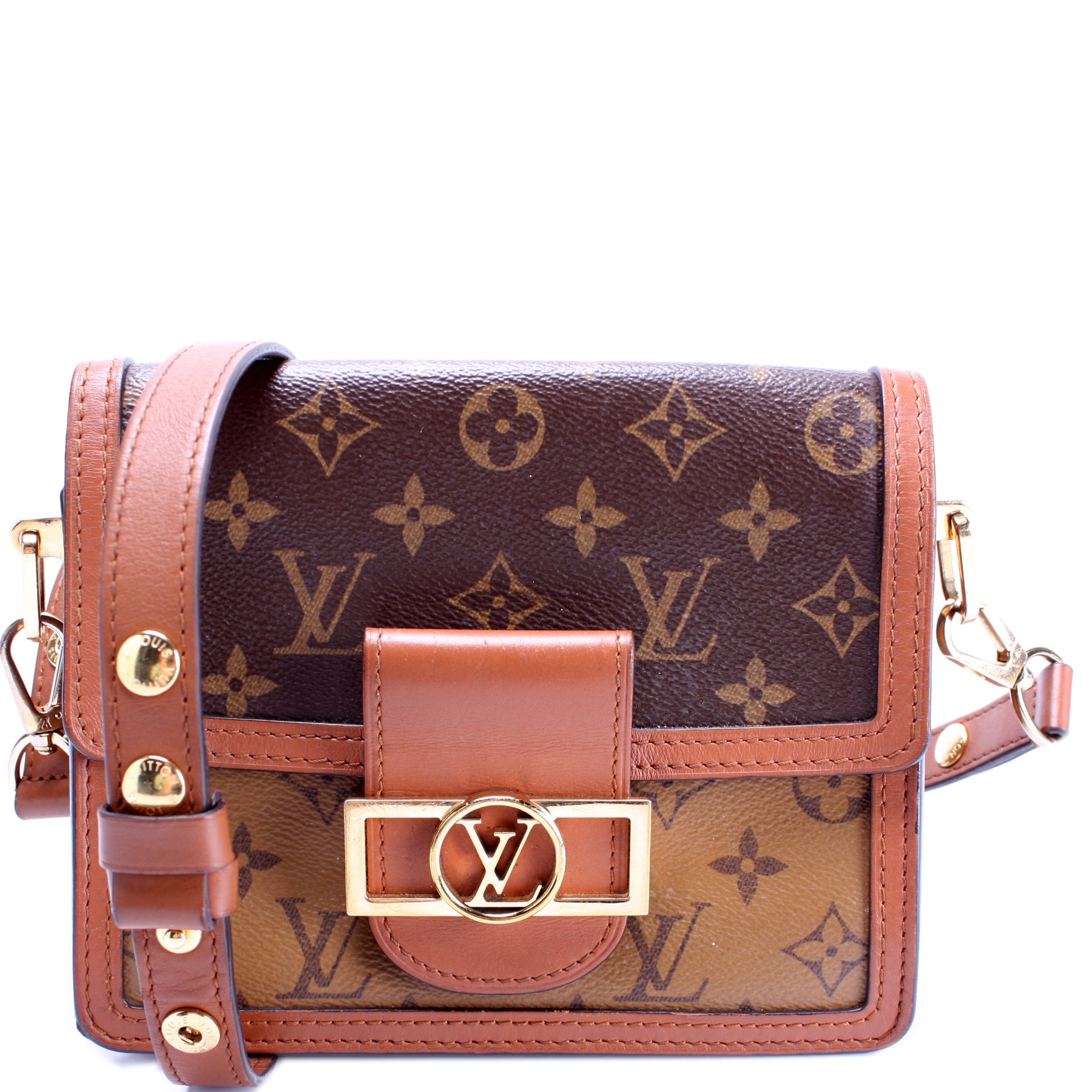 Wearing the Mini Dauphine bag from Louis Vuitton