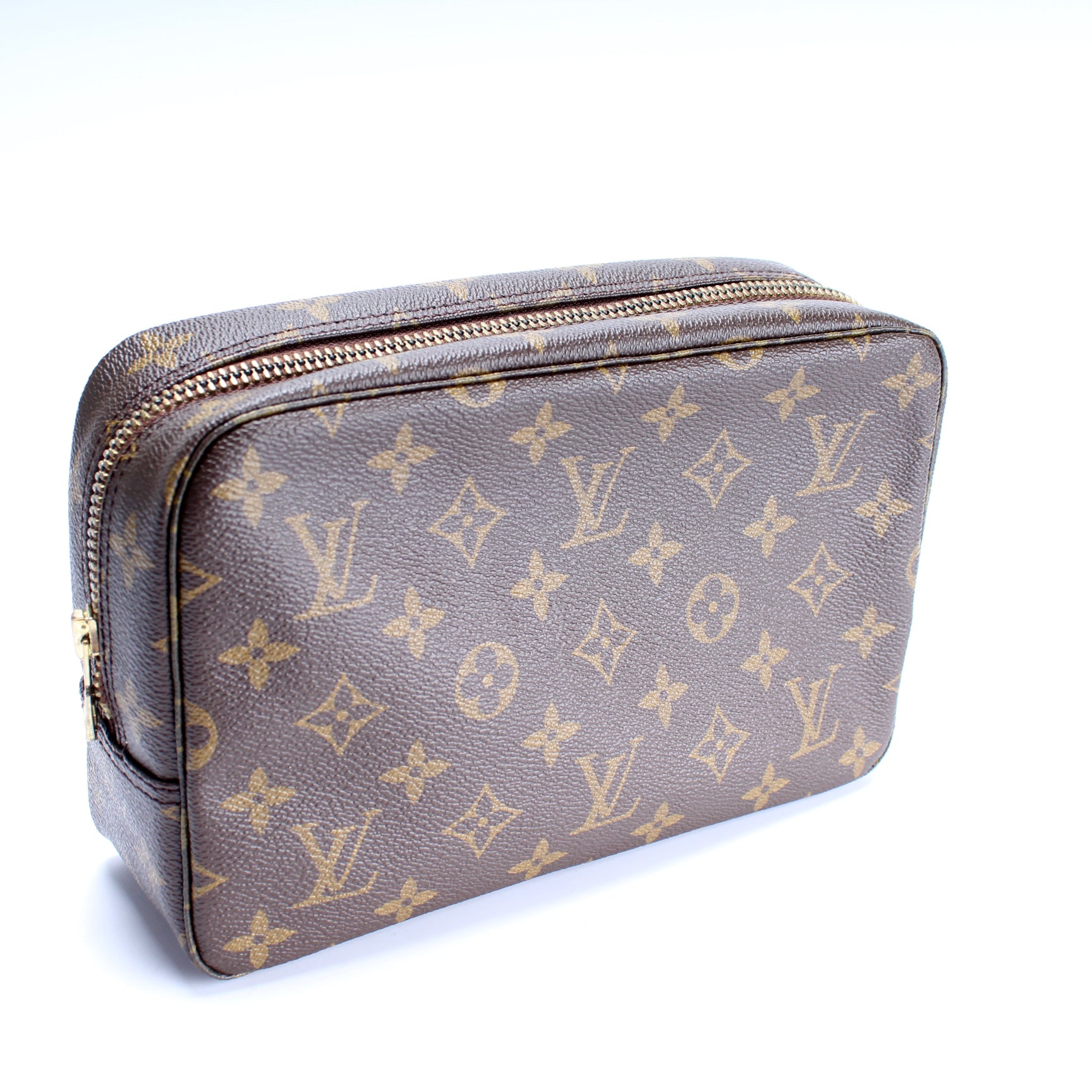 Louis Vuitton, Bags, Authenticity Guaranteed Louis Vuitton Monogram Trousse  Toilette Clutch Hand Bag