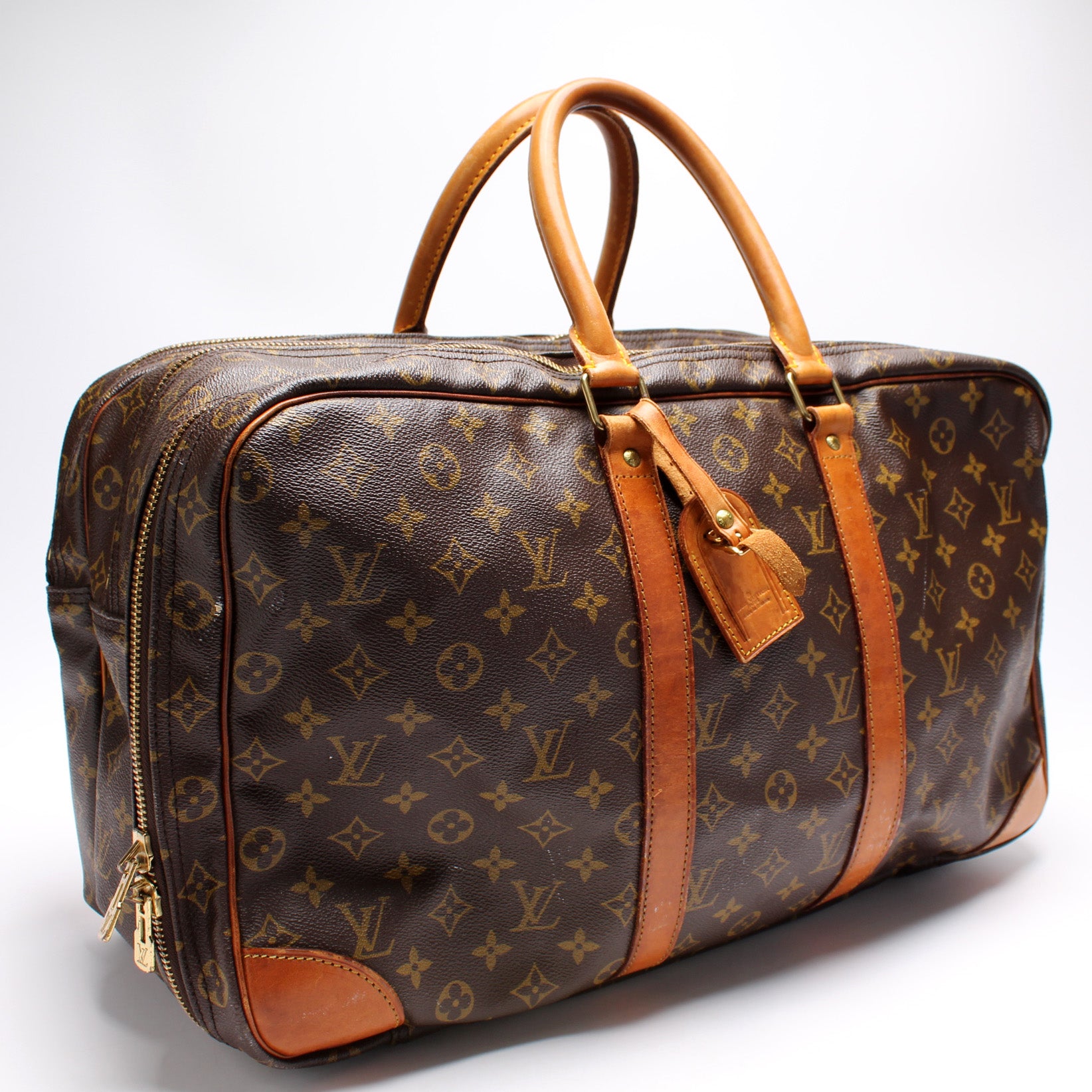 Authentic Louis Vuitton Monogram Luggage Weekender Bag Sirius