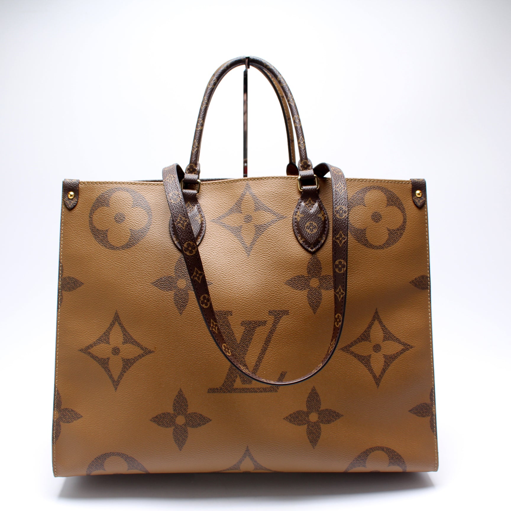 Louis Vuitton Monogram Reverse On The Go GM Tote Bag – Shaikha's