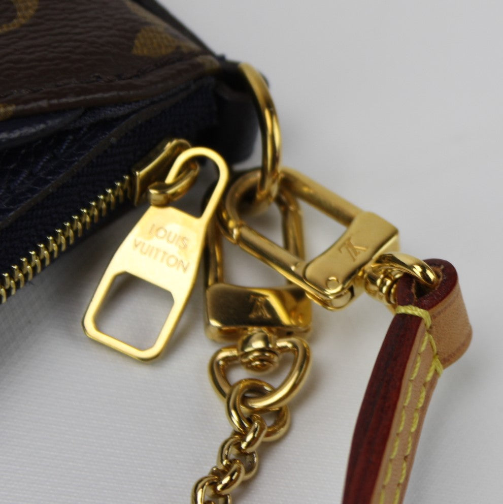 Pallas Clutch Monogram – Keeks Designer Handbags